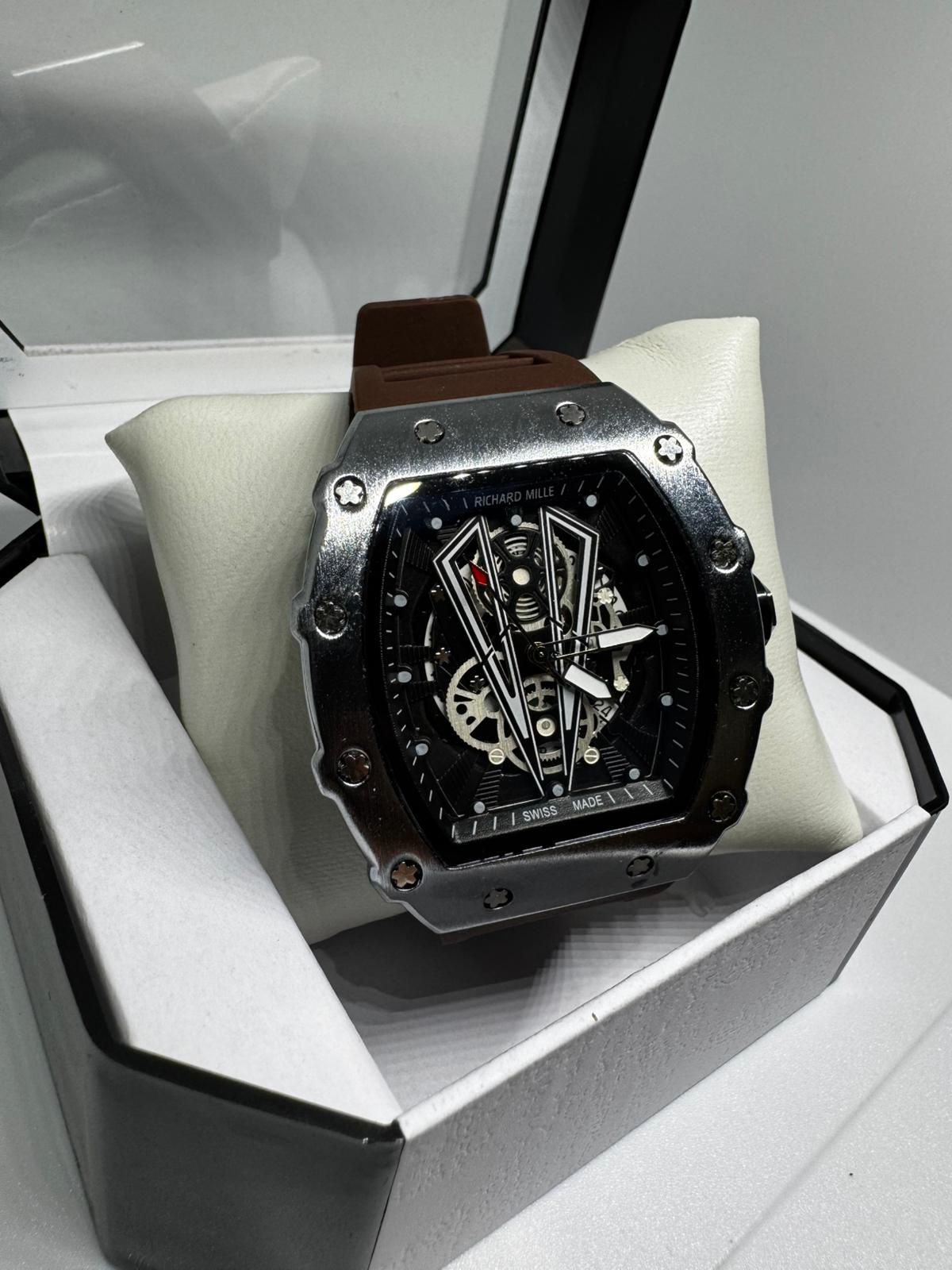 RELOJ RICHARD MILLE GRIS Y MARRONES DETALLES NEGROS