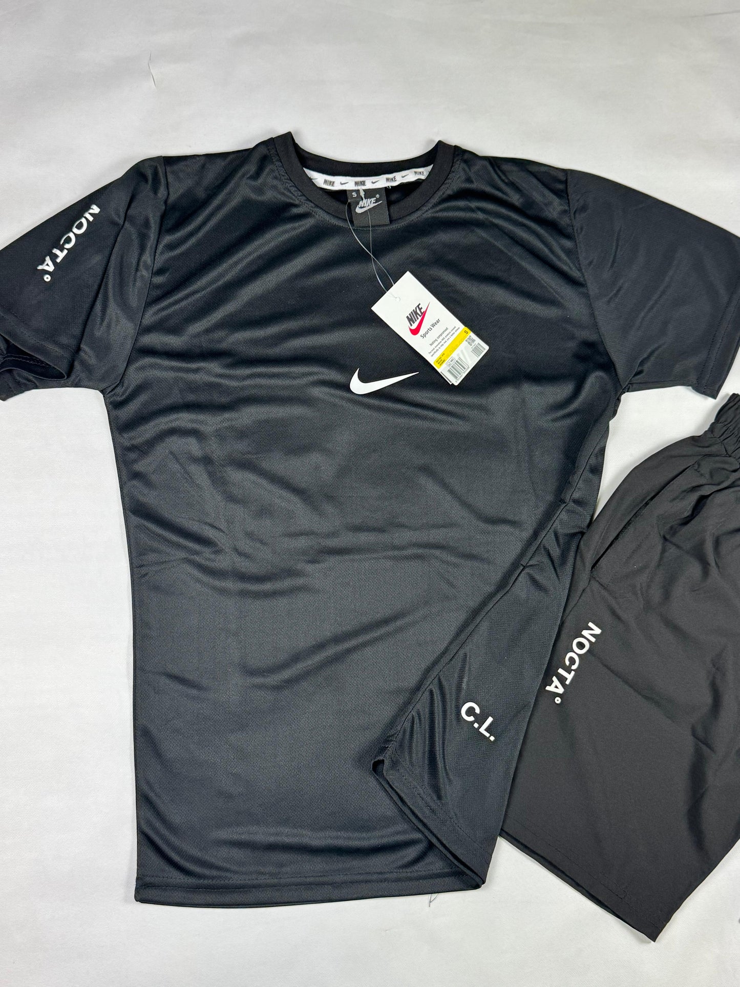 Conjunto nike x nocta negro logo blanco