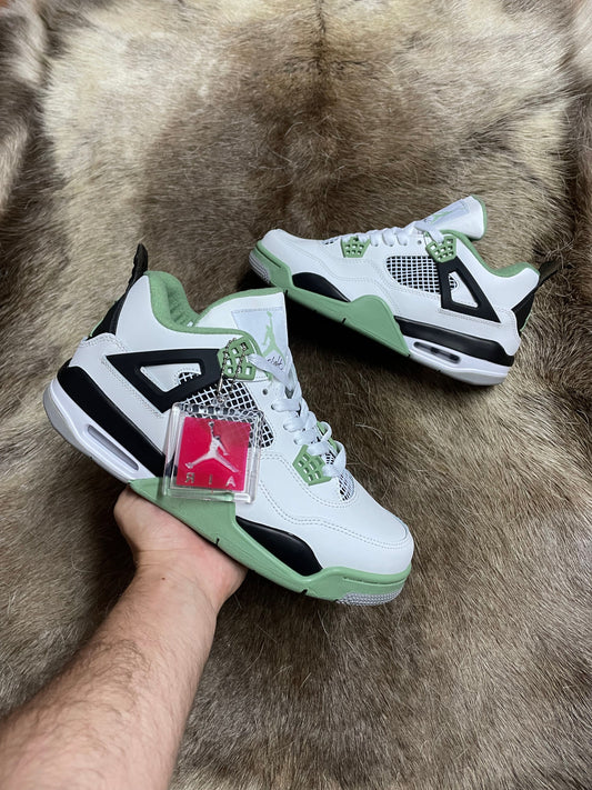 JORDAN 4 blancas detalles negros y verdes