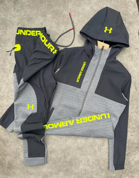 Chandal under armour negro y gris logo amarillo