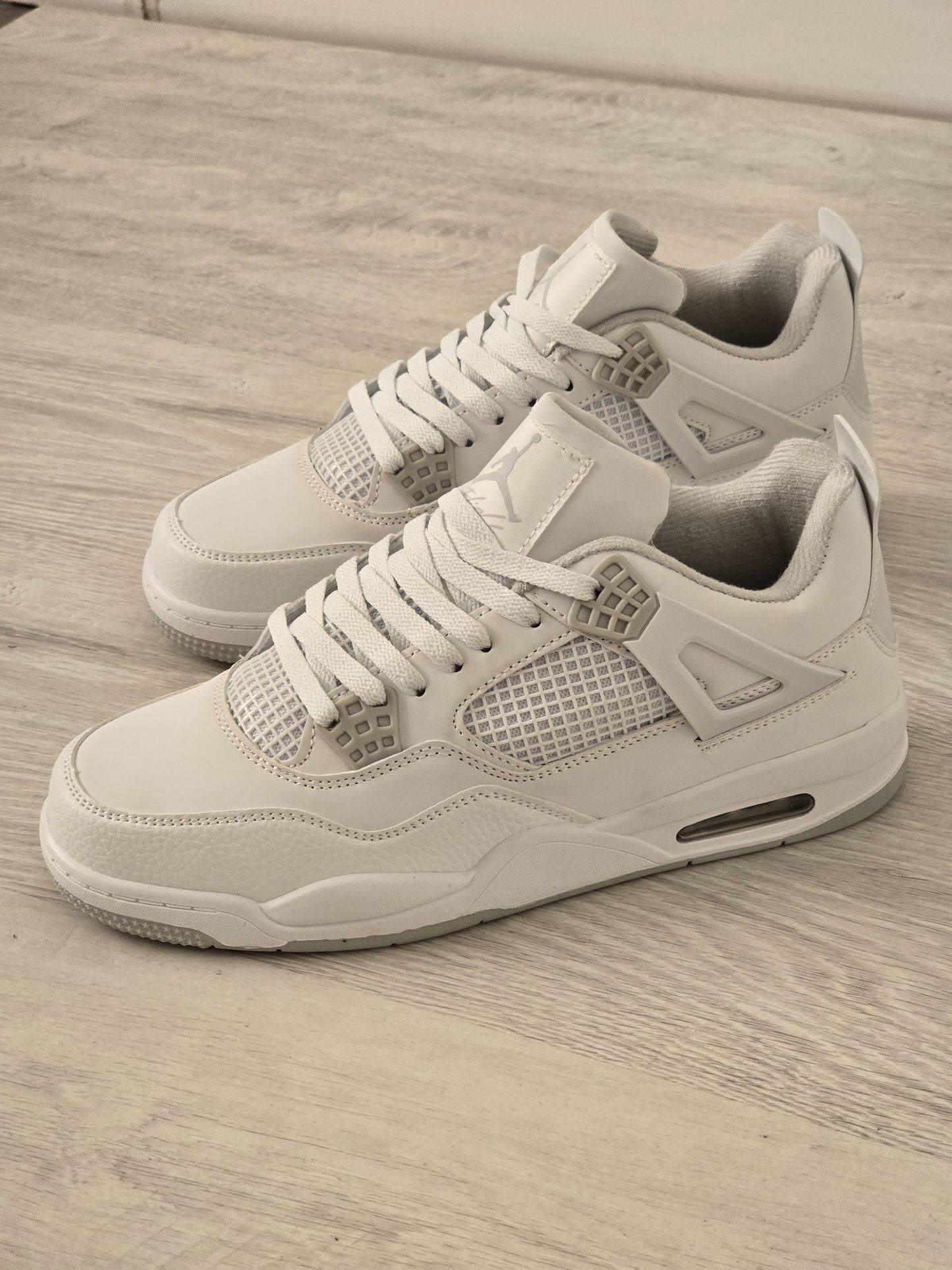 Jordan 4 blanca gris