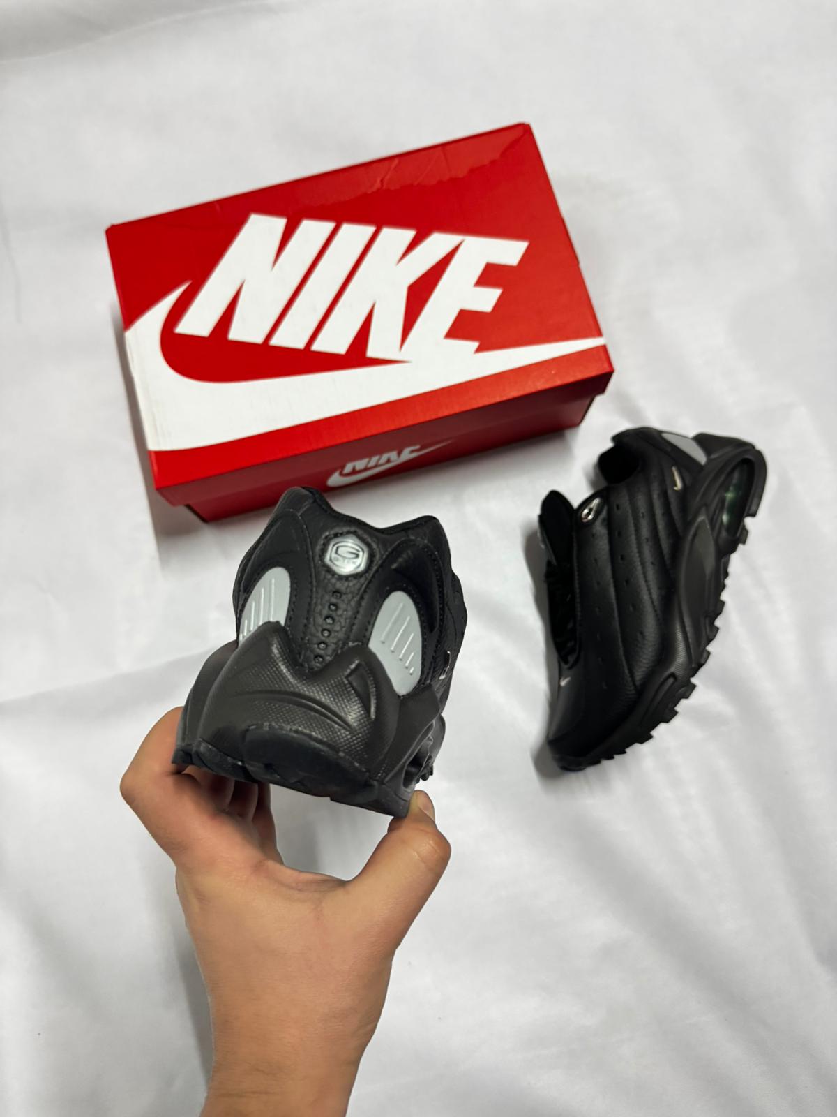 Nike nocta negro logo plateado