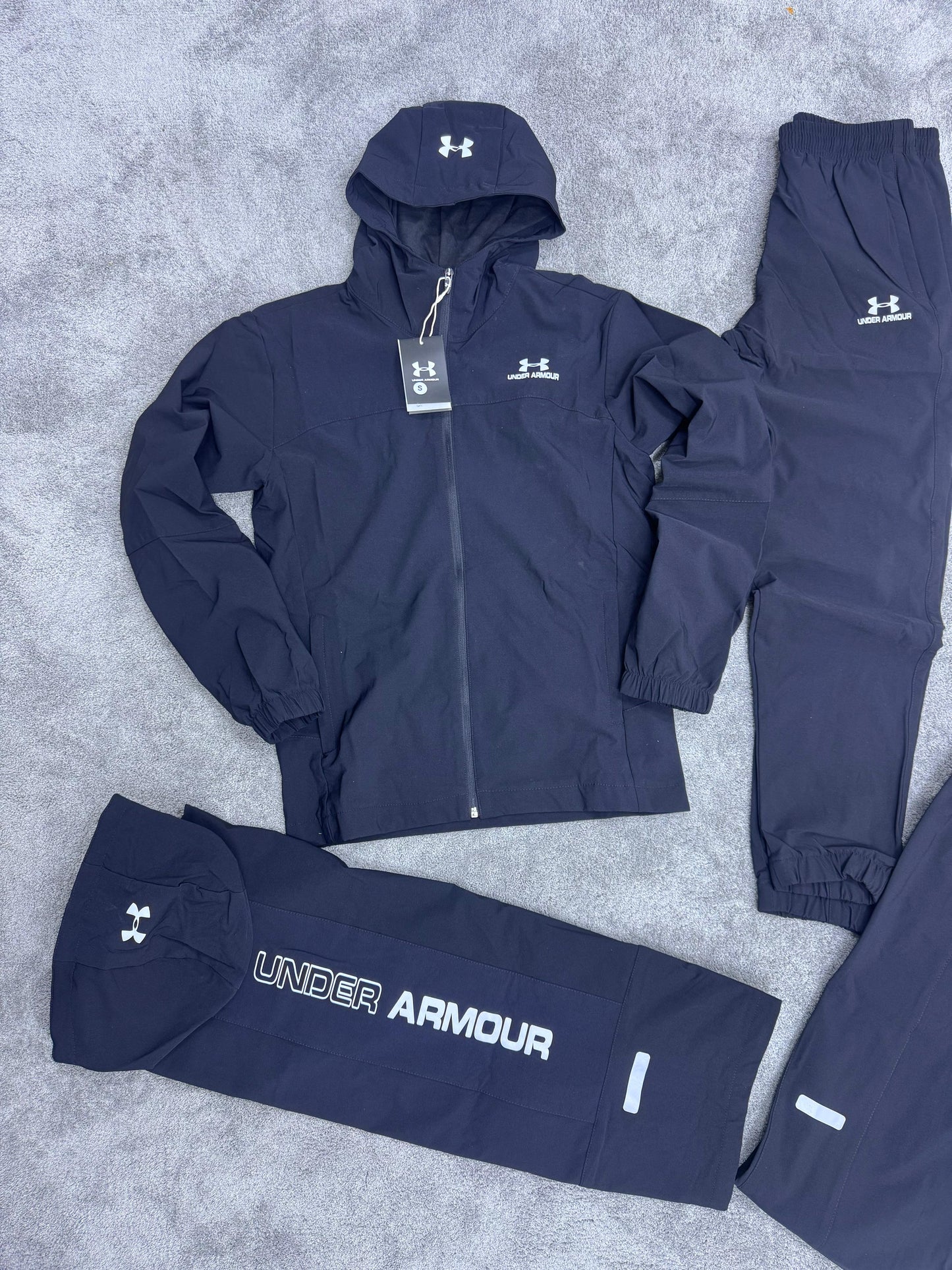 Chandal under armour negro logo blanco