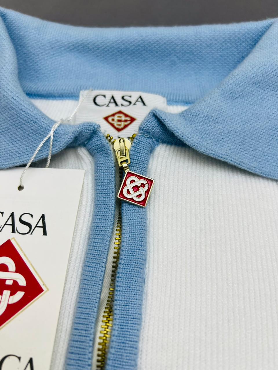 Camiseta Casablanca blanco y azul logo rojo y blanco contorno dorado