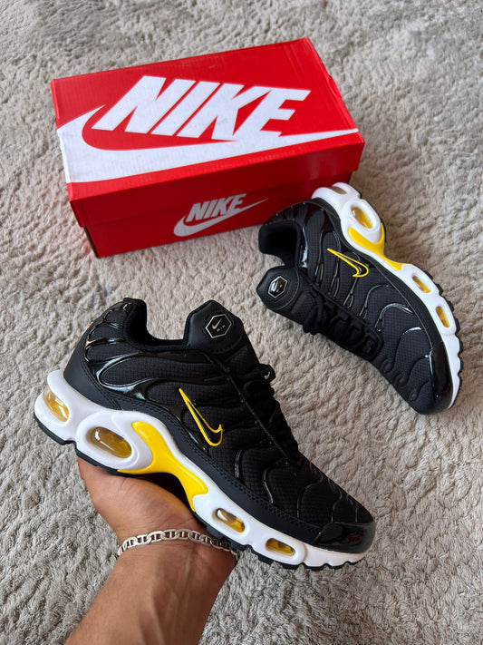 TN NEGRAS LOGO NEGRO CONTORNO AMARILLO