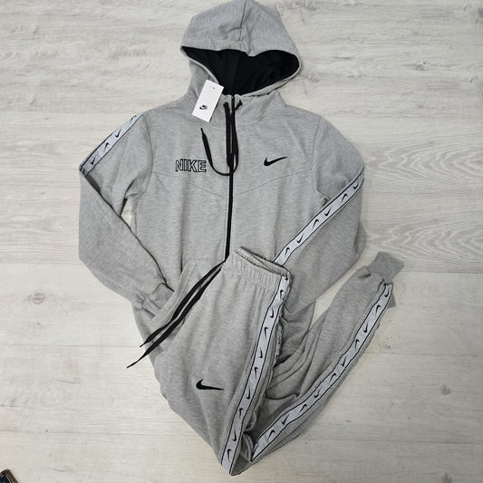 Chandals nike gris logos laterales