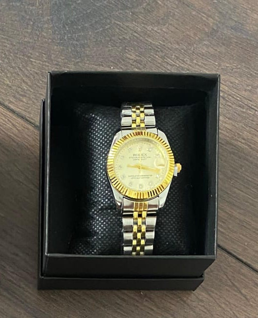 Reloj Rolex dorado blanco y plateado