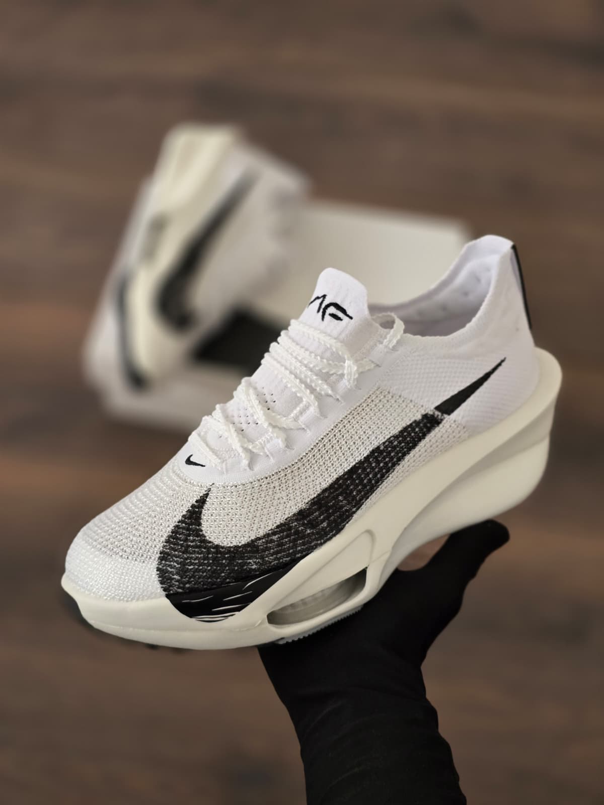 Air zoom blanca logo negro