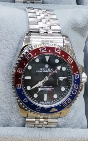 RELOJ ROLEX Plateado azul y rojo