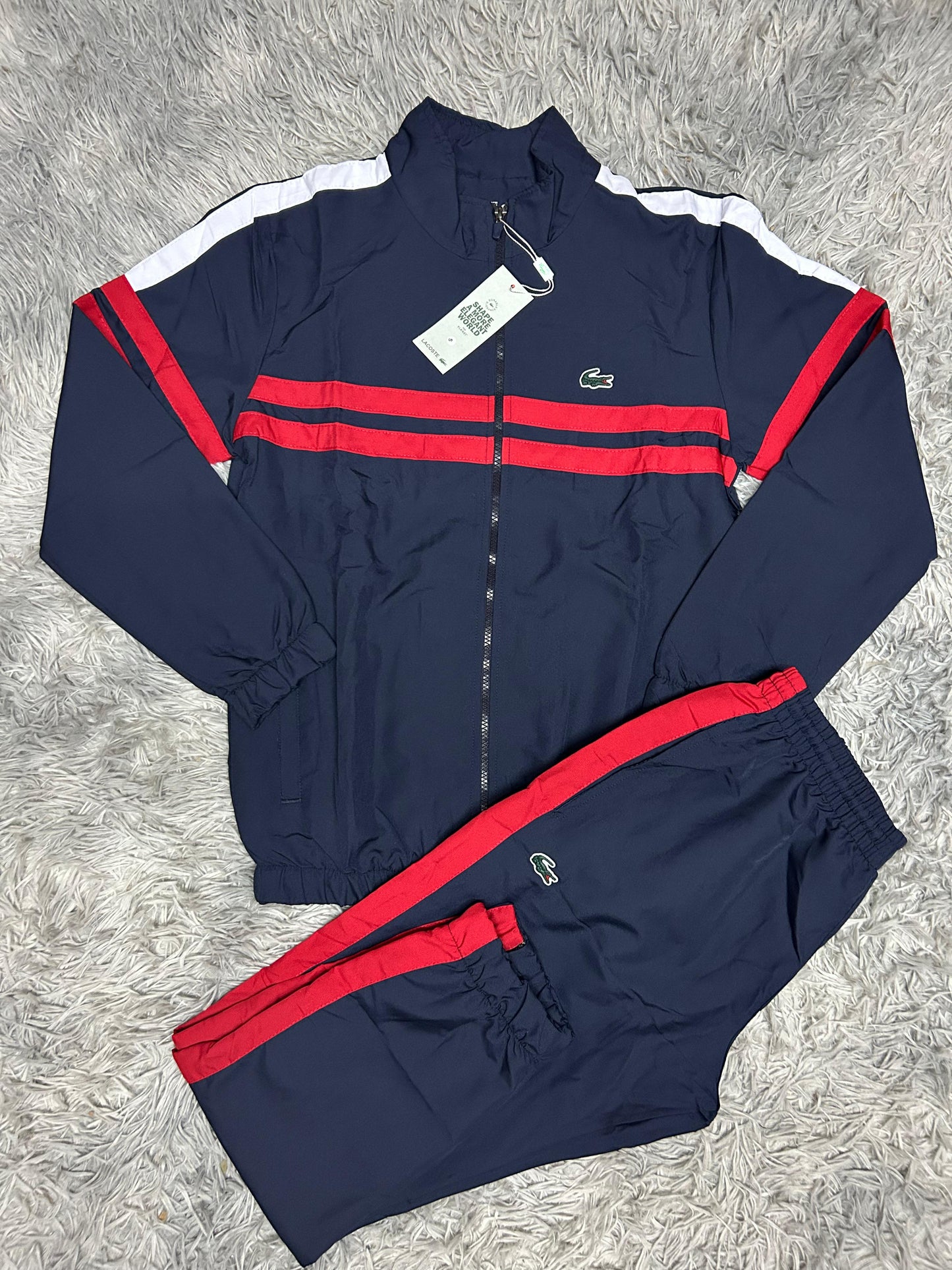 Chandal lacoste azul logo verde detalles rojos y blancas