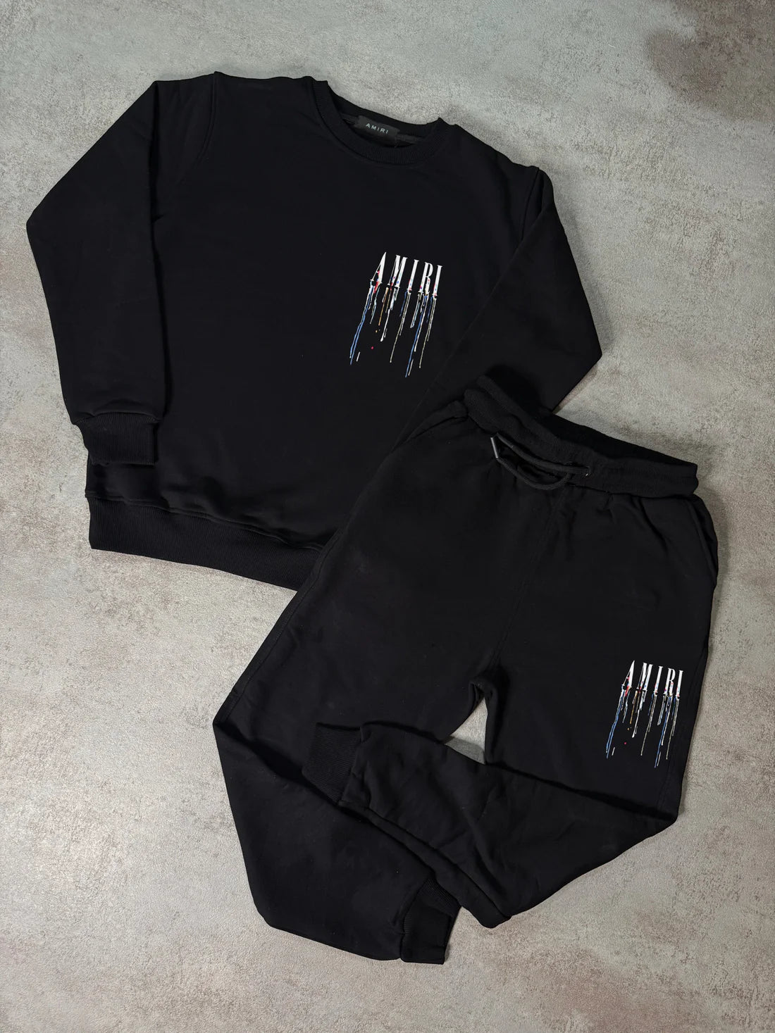 Chandal AMIRI negro logo blanco colores