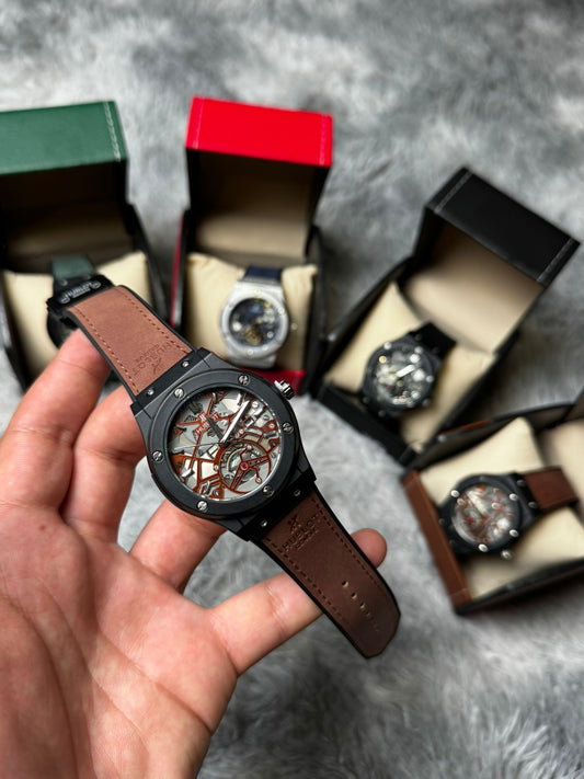 RELOJ HUBLOT negro y marron