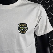 Camiseta LACOSTE azul marino logo verde y amarillo