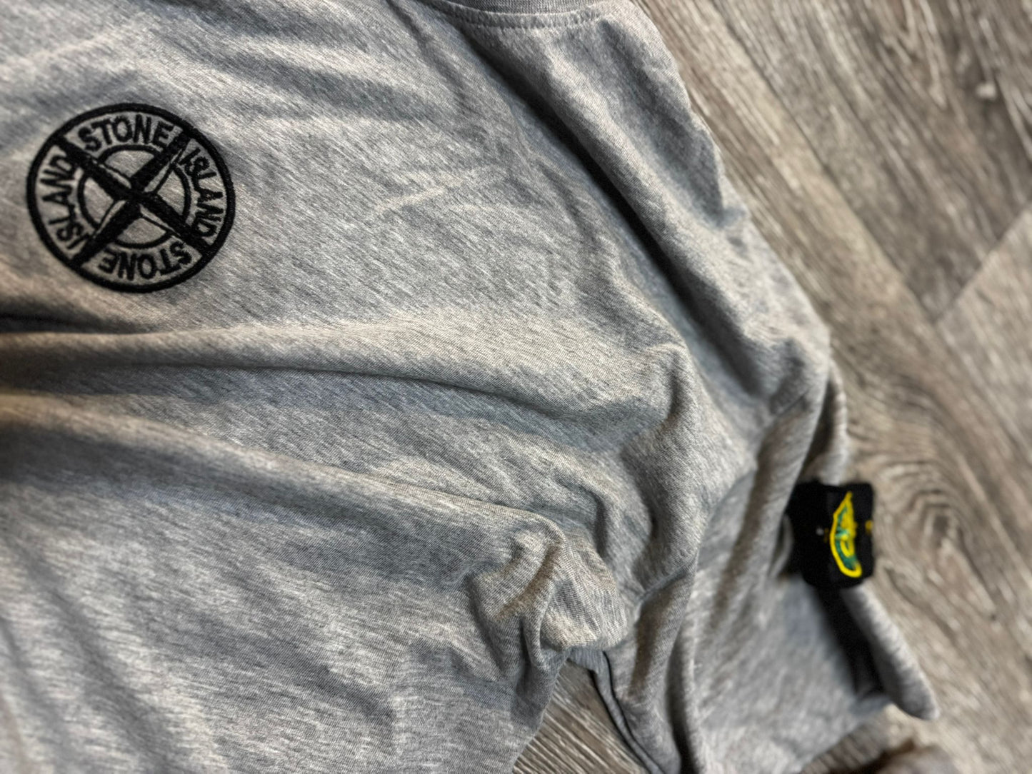 Conjunto gris stone island