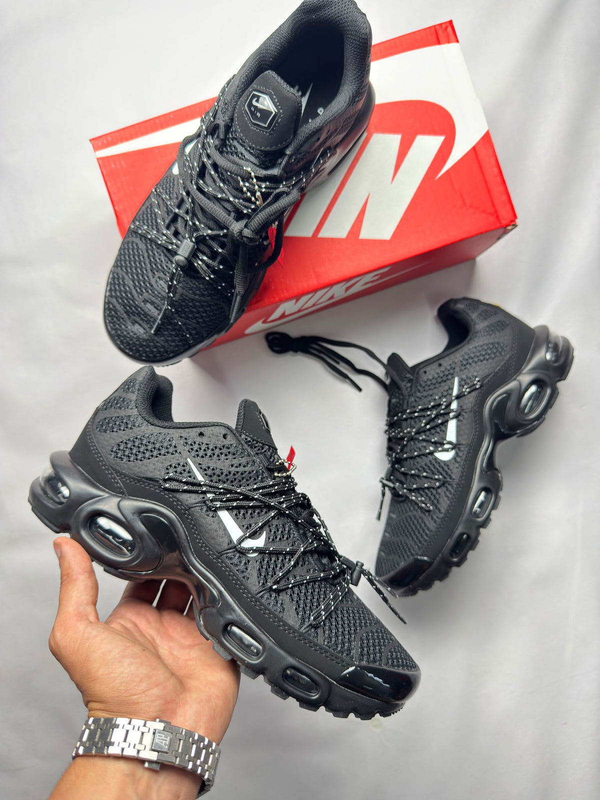 Nike Tl negras logo blanco