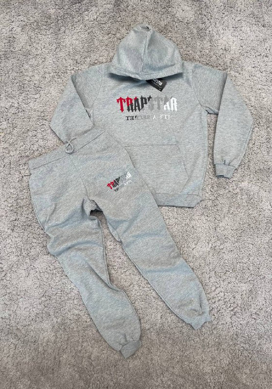 CHANDAL TRAPSTAR GRIS LOGO TRICOLOR