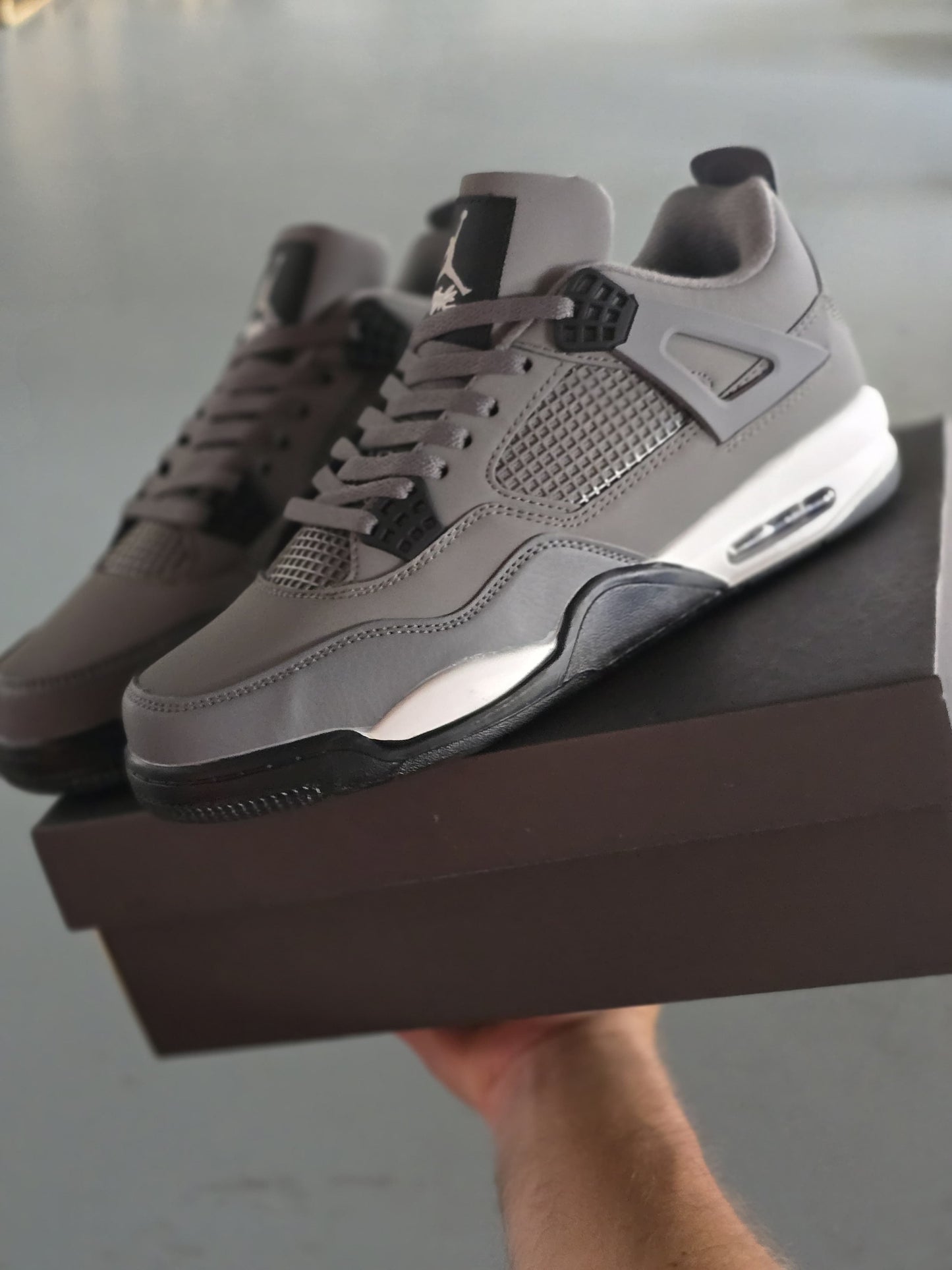 Jordan 4 gris