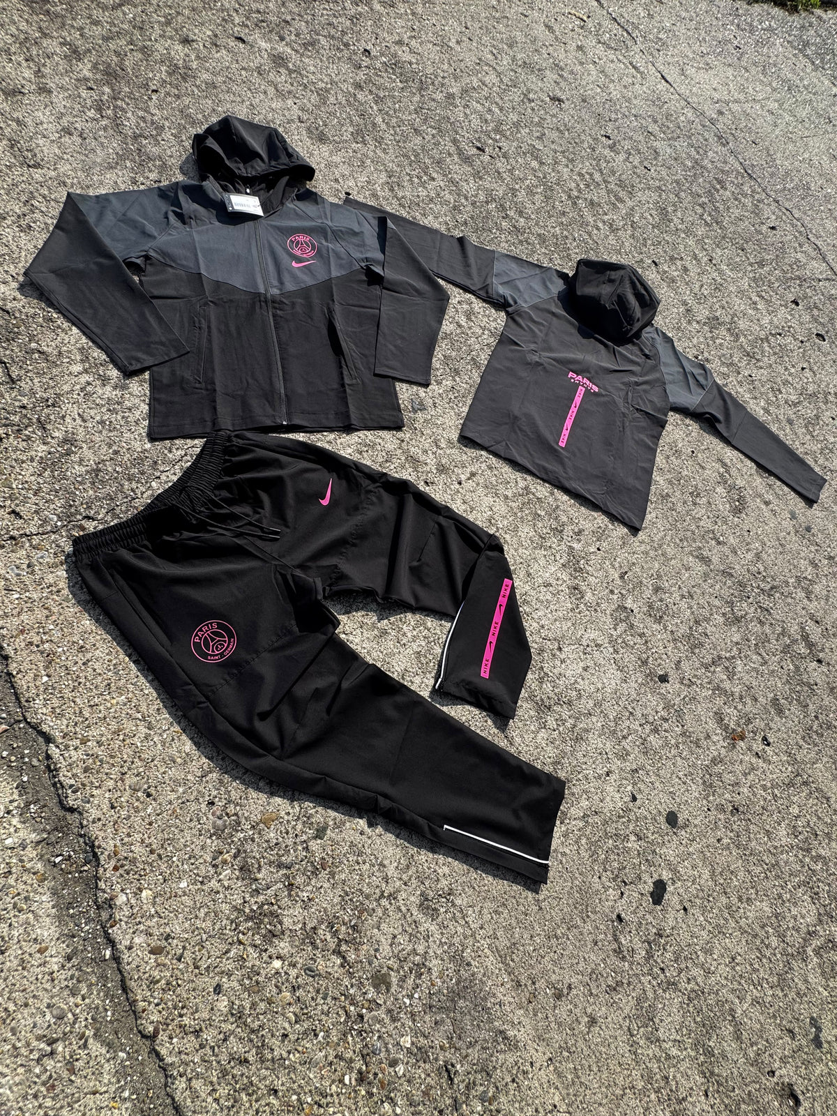 Chandal PSG negro logo rosa