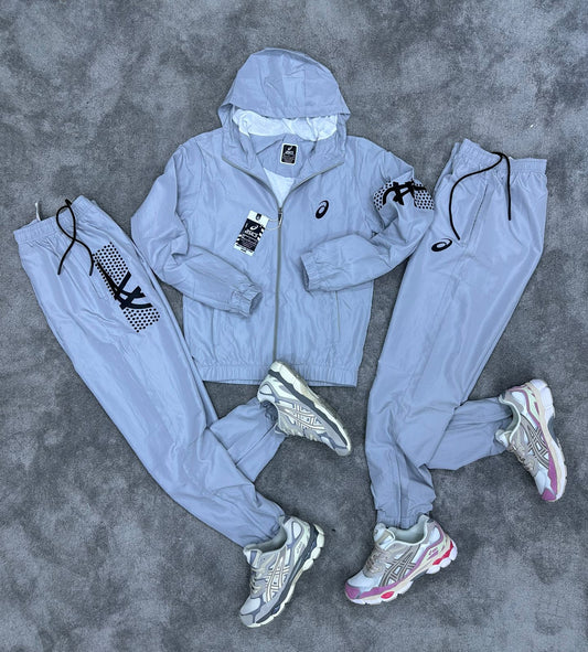 Chandal ASICS gris logo negro