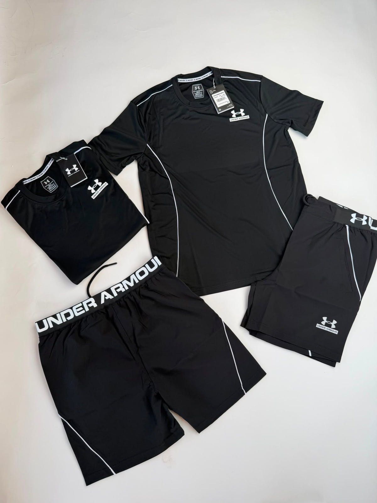 Conjunto corto under armour negro logo blanco