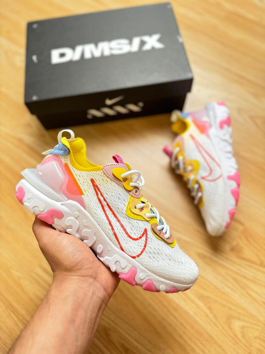 Nike react vision blanco logo rosa detalles amarillos