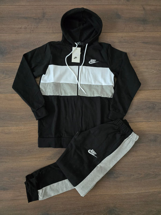 Chandal nike negro franja en medio blanca gris