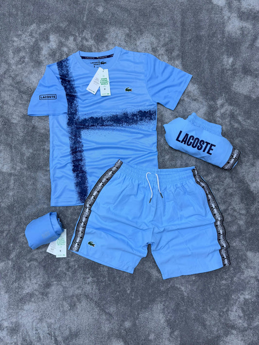 Conjunto corto lacoste azul logo verde detalles azul marino