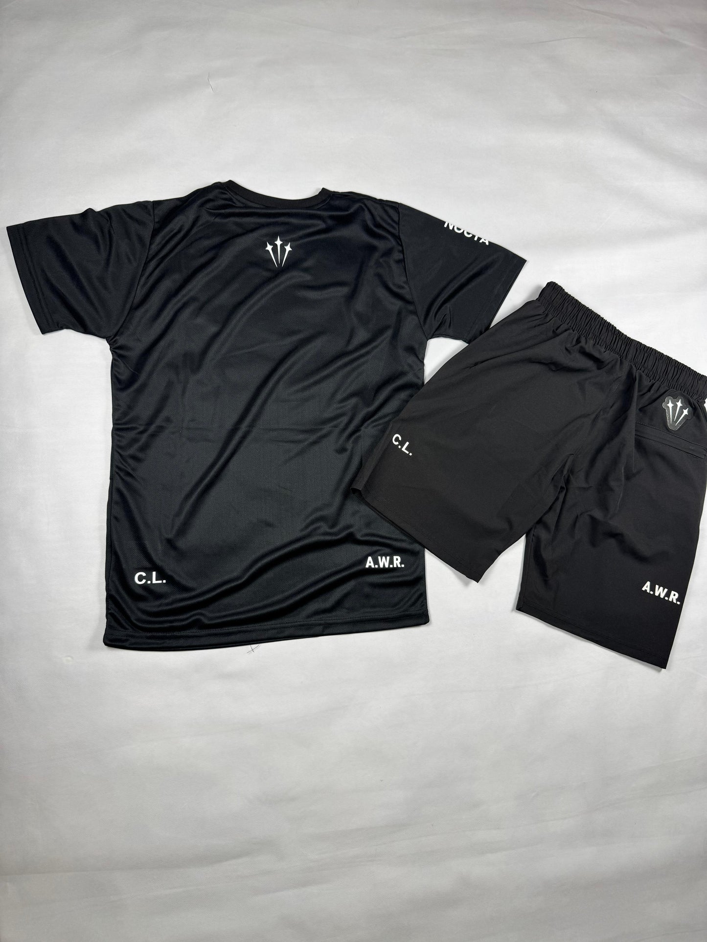 Conjunto nike x nocta negro logo blanco