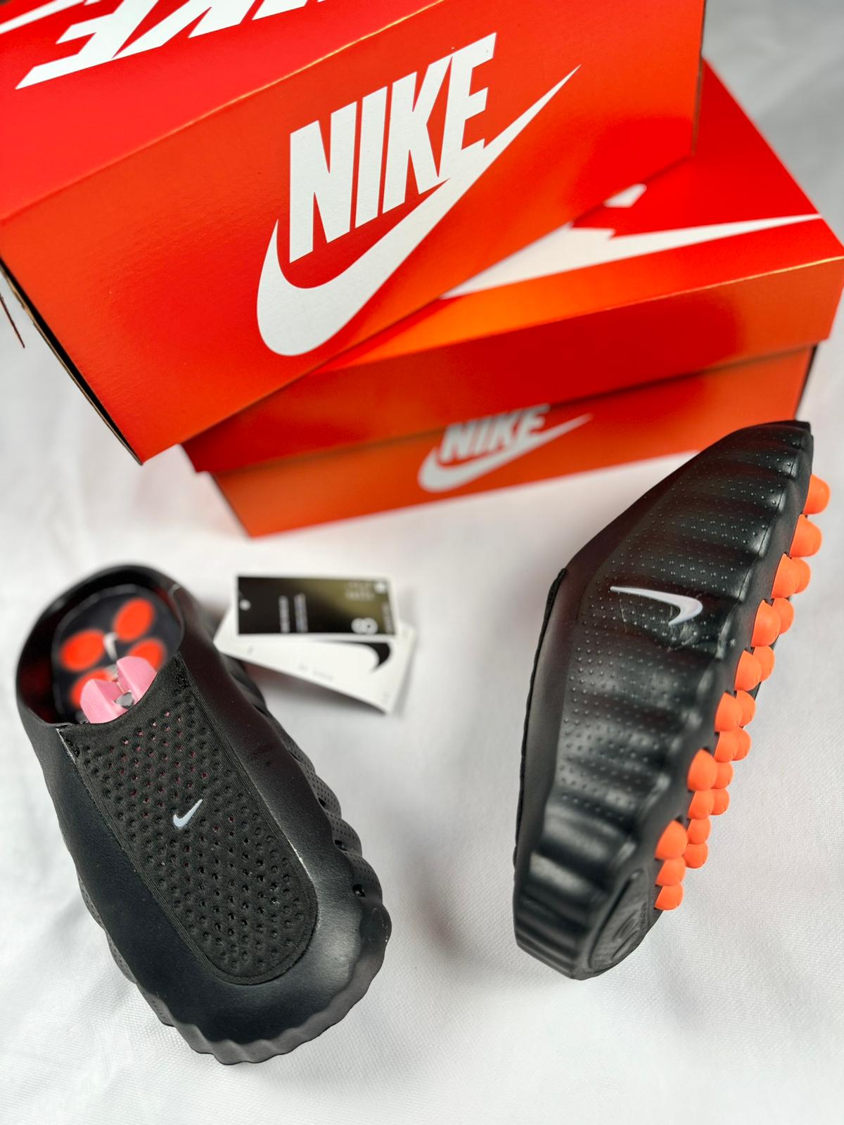 Nike Mind 001 negras logo plateado