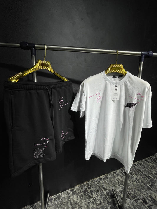 Conjunto AMIRI blanco logo rosa y negro