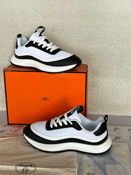 Hermes negras y blancas
