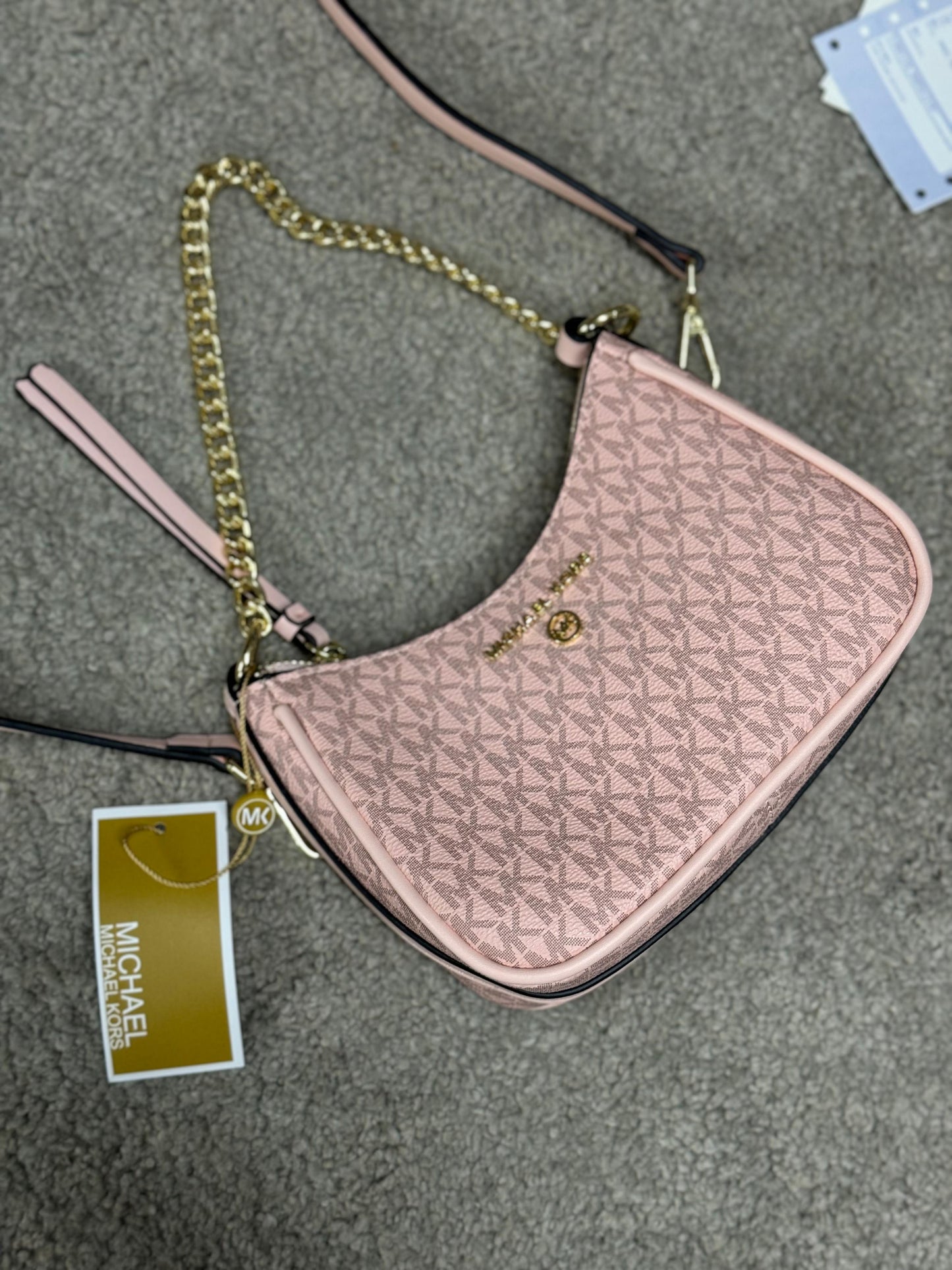 Bolso Mickael Kors rosa logo dorado