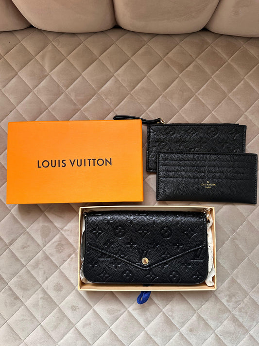 Bolso LV negro logo dorado Pochette Félicie