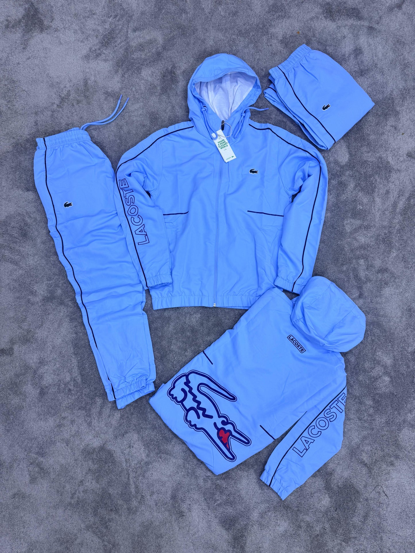 Chandal LACOSTE azul logo verde logo grande en espalda