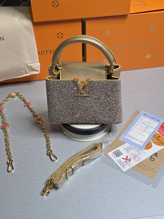 Bolso LV dorado brillos