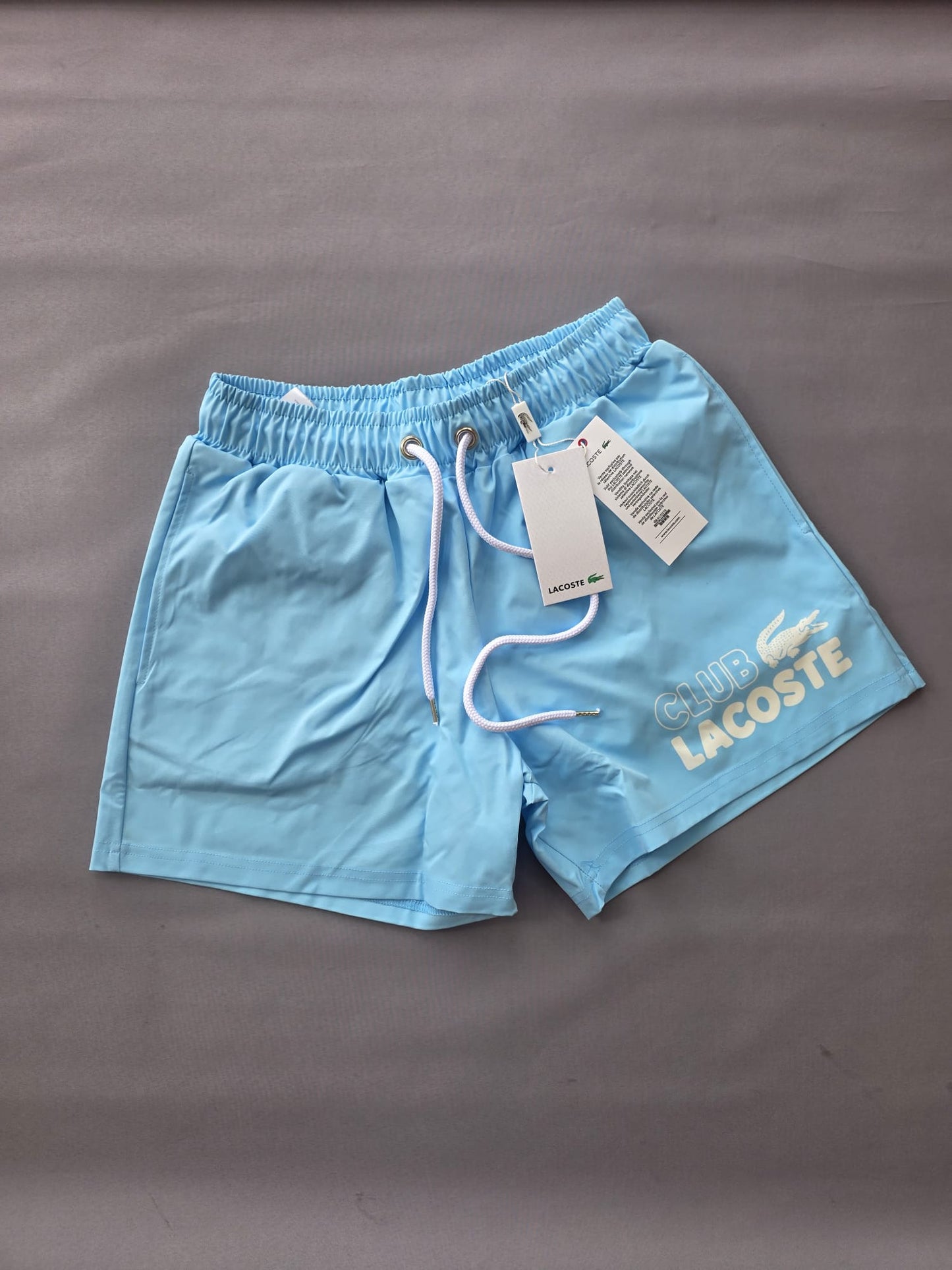 Bañador Lacoste azul logo blanco