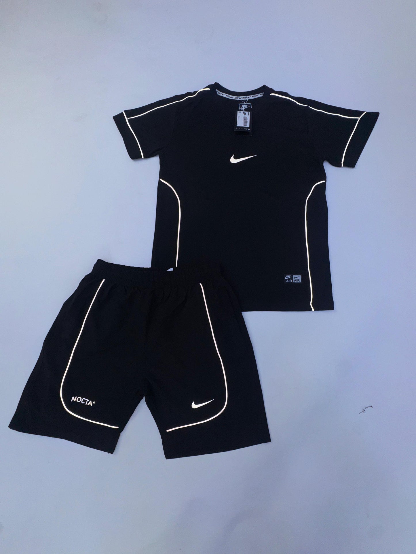 Conjunto corto nike x nocta negra logo blanco lineas blancas