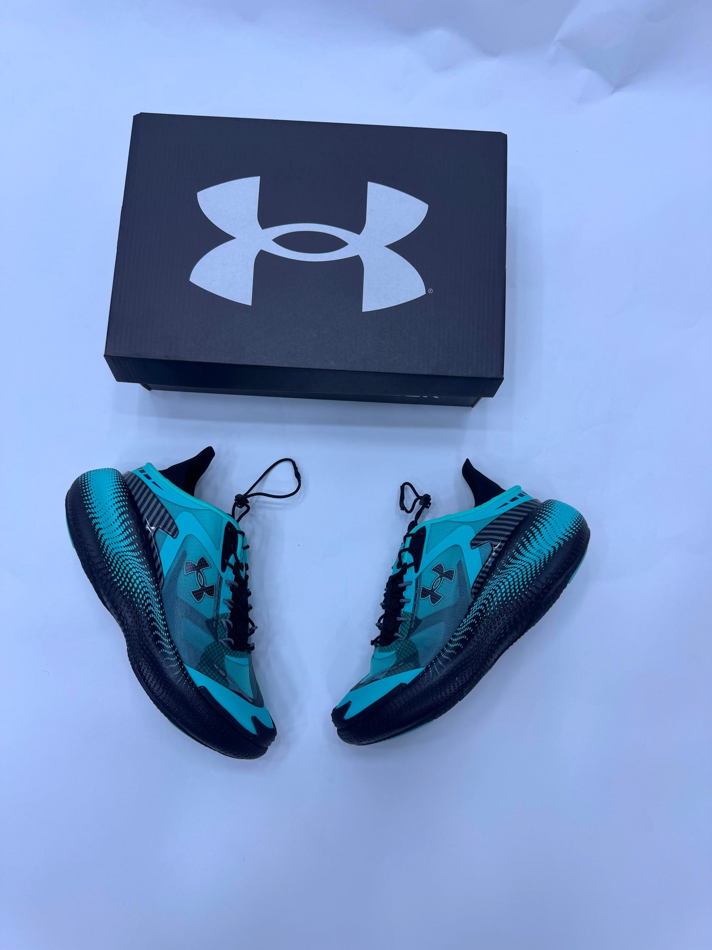 Mansory × Under Armour azules logo negro