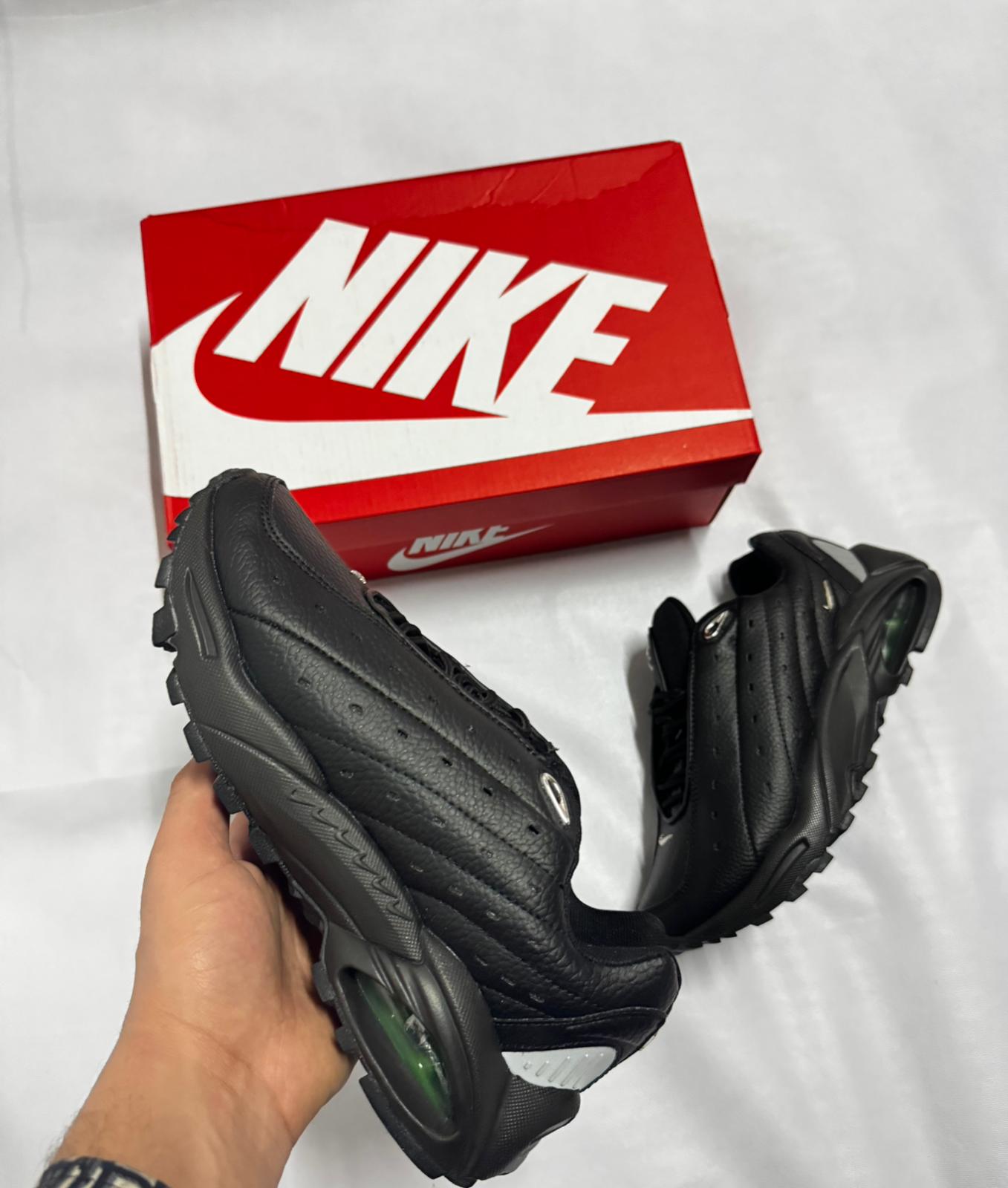 Nike nocta negro logo plateado