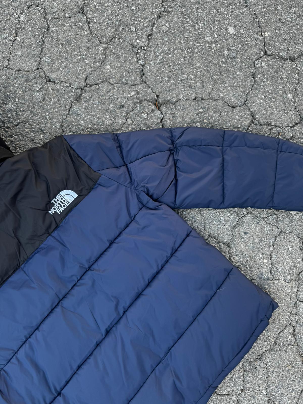 Chaqueton North Face azul y negro