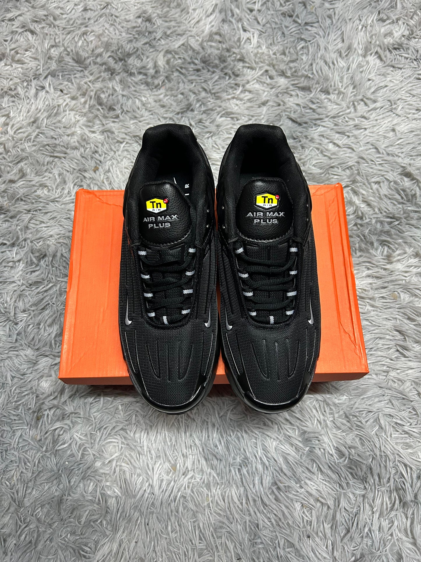 Tn Tunned negras logo plateado