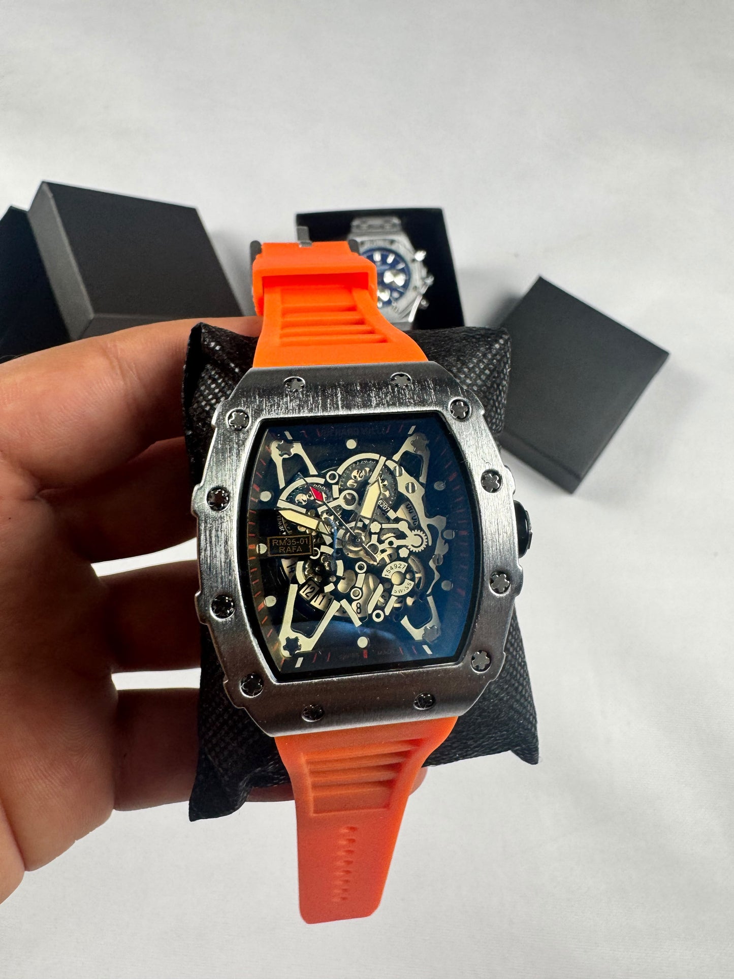RELOJ RICHARD MILLE PLATEADOS Y NARANJAS