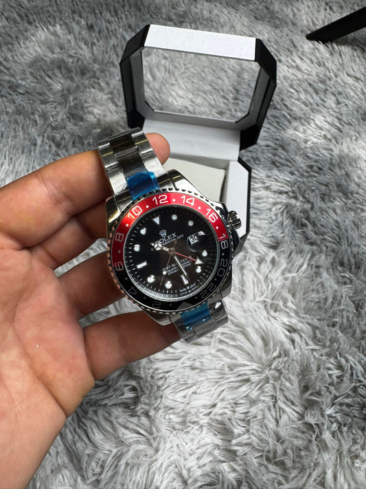 RELOJ ROLEX PLATEADO DETALLES ROJOS Y NEGROS