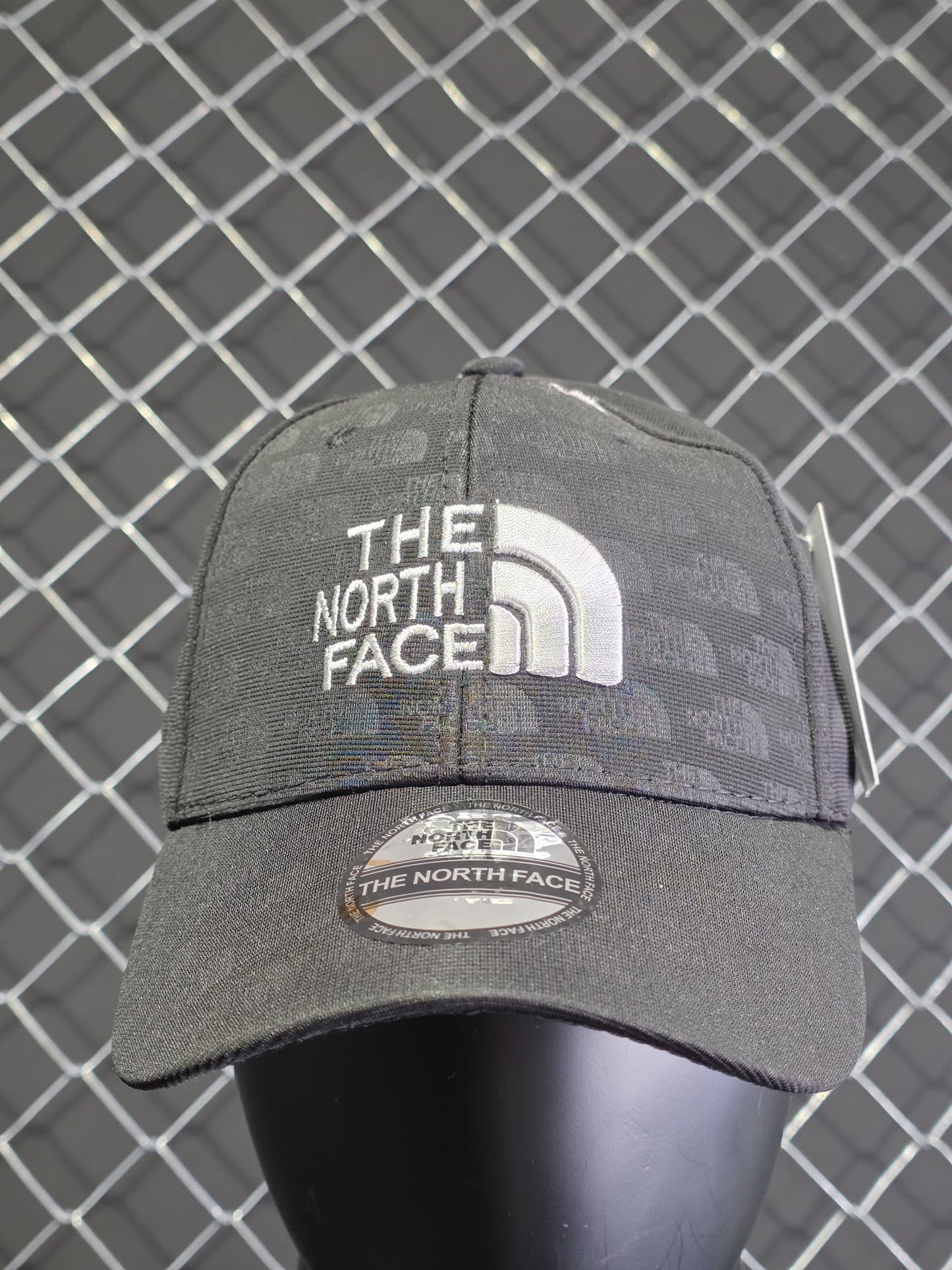 Gorra North Face gris logo blanco