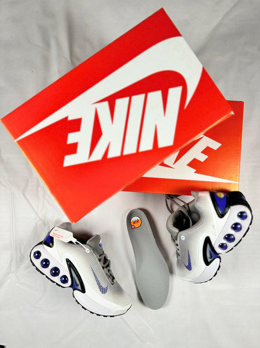 Nike TN DN blancas logo azul detalles negros