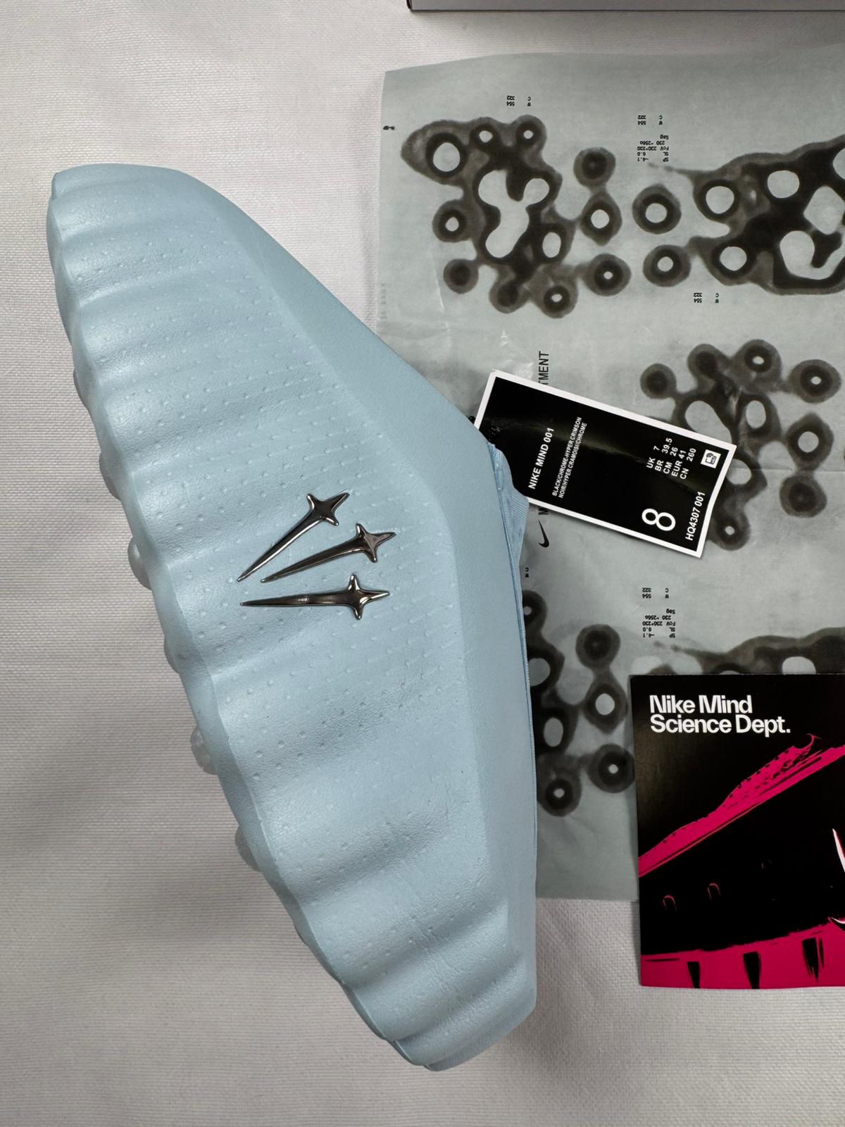 Nike Mind 001 x Nocta azul claro degradado logo negro