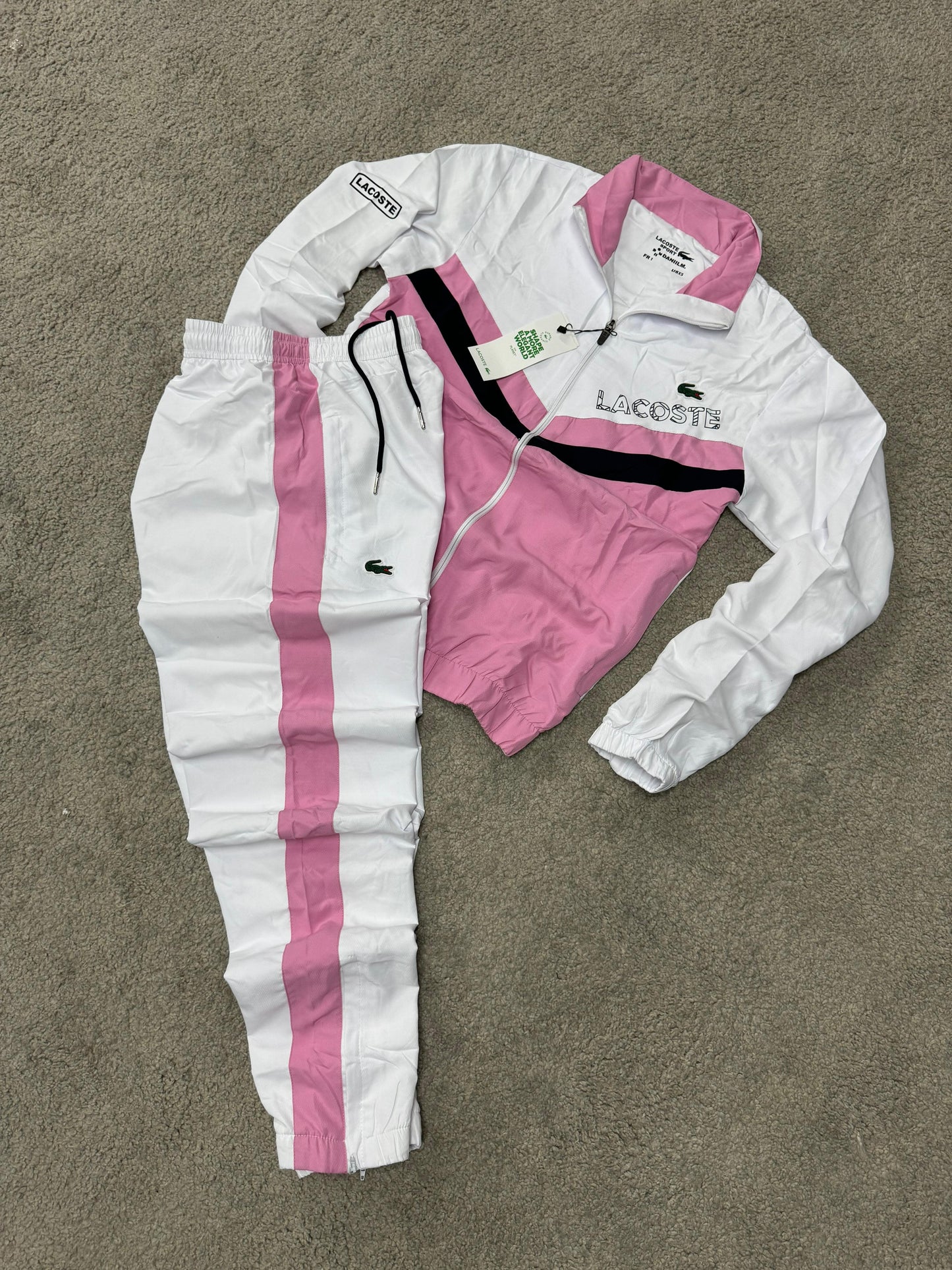 Chandal LACOSTE rosa y blanco