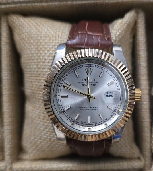 Reloj rolex plateado y marron