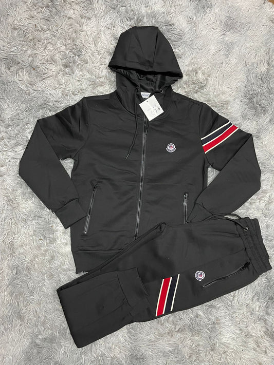 Chandal moncler negro logo blanco detalles rojos y azules