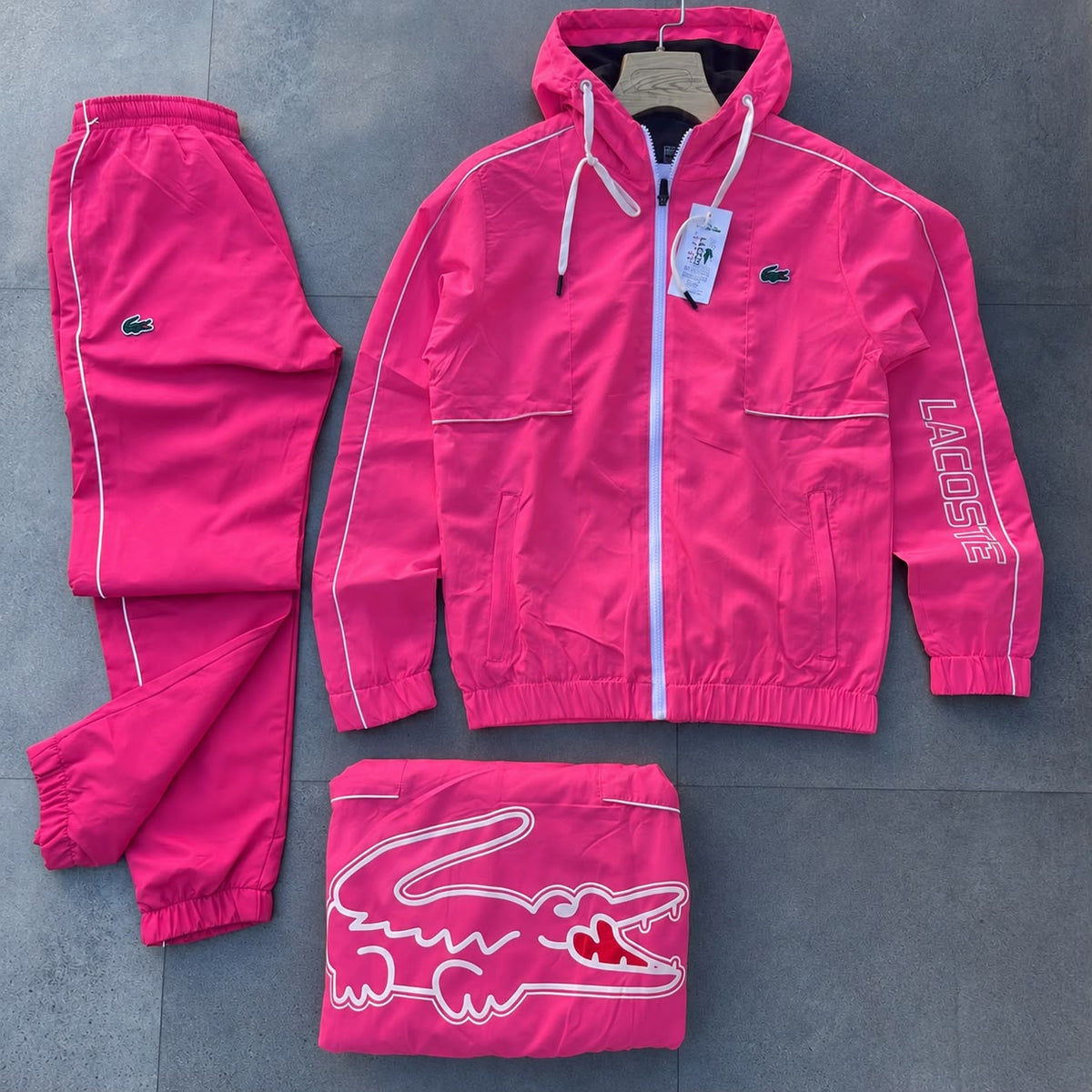 Chandal lacoste rosa logo verde logo en espalda